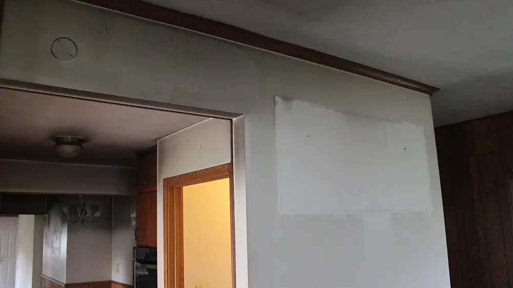 Soot on a wall near a fire